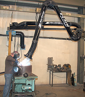 Extractor arm with boom captures welding smoke.